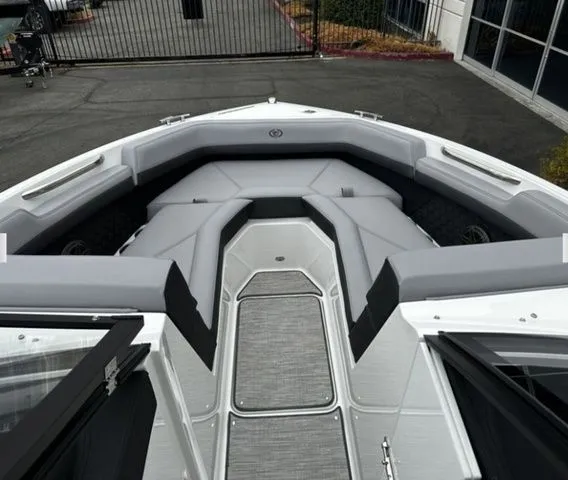 Slide: The Image of Interior view of 2025 Cobalt R4 boat with gray upholstery. - 9