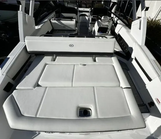 Slide: The Image of Interior of 2025 Cobalt R4 boat with luxurious white seating. - 5
