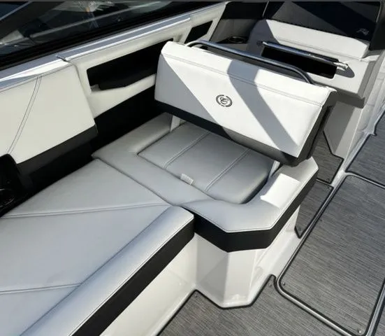 Slide: The Image of Interior of Cobalt R4 boat, 2025 model, featuring luxurious white seating. - 9