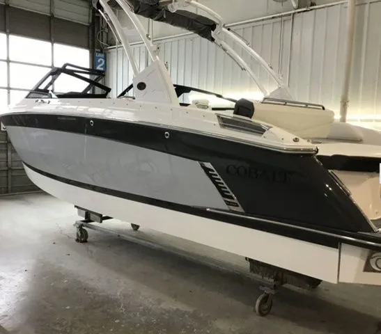 The Image of 2025 Cobalt R6 Surf boat in a storage facility. - 1