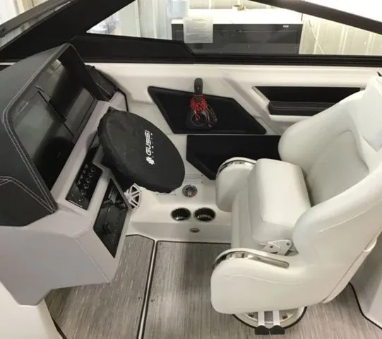 Slide: The Image of Interior of 2025 Cobalt R6 Surf with white seat and dashboard. - 11