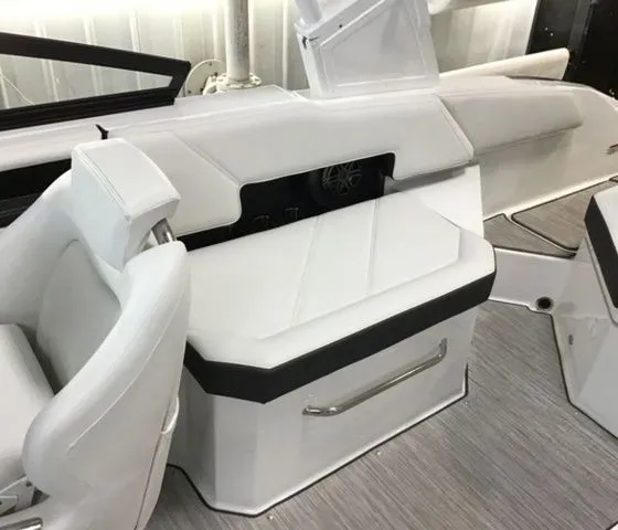 Slide: The Image of Interior of 2025 Cobalt R6 Surf with white leather seating. - 12