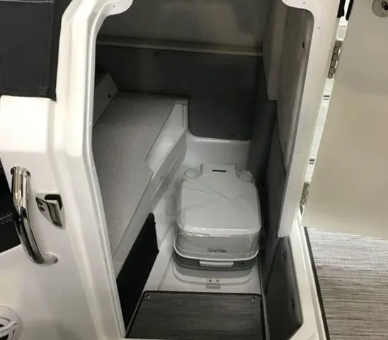 Slide: The Image of Interior of 2025 Cobalt R6 Surf with portable toilet. - 16