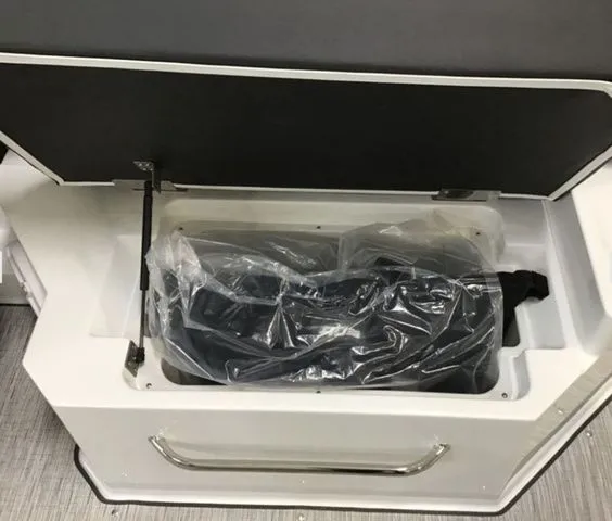 Slide: The Image of Storage compartment in 2025 Cobalt R6 Surf boat. - 17