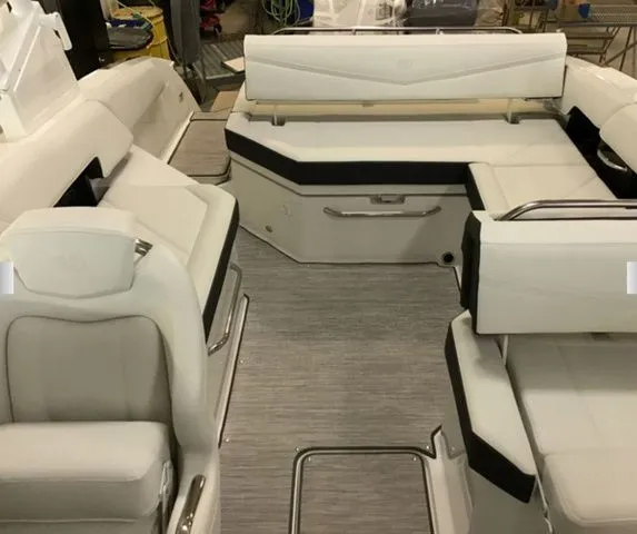 Slide: The Image of Interior of 2025 Cobalt R6 Surf with luxurious white seating. - 8