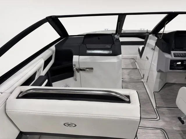 Slide: The Image of Interior of 2025 Cobalt R6 boat with modern seating and dashboard. - 10