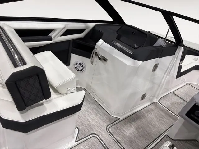 Slide: The Image of Interior of 2025 Cobalt R6 boat with modern seating and dashboard. - 11