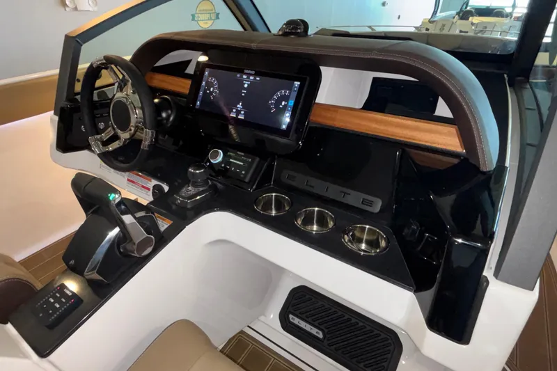 Slide: The Image of 2026 Monterey Elite 30 OB dashboard with modern controls and sleek design. - 29