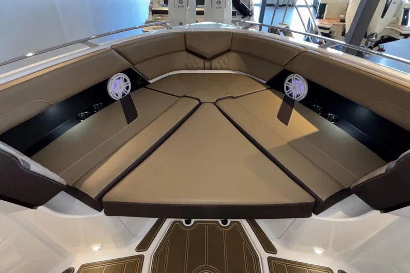 Slide: The Image of Luxurious seating area on the 2026 Monterey Elite 30 OB boat. - 42