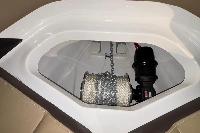 Slide: The Image of Anchor chain compartment of 2026 Monterey Elite 30 OB boat. - 48