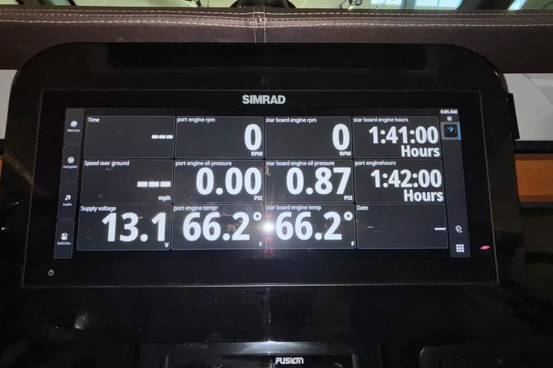 Slide: The Image of Simrad display on 2026 Monterey Elite 30 OB showing engine metrics and supply voltage. - 6