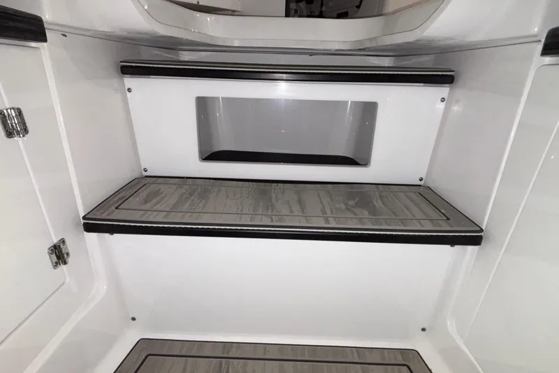 Slide: The Image of Interior steps of 2026 Monterey Elite 30 OB boat, featuring sleek design and modern finish. - 61