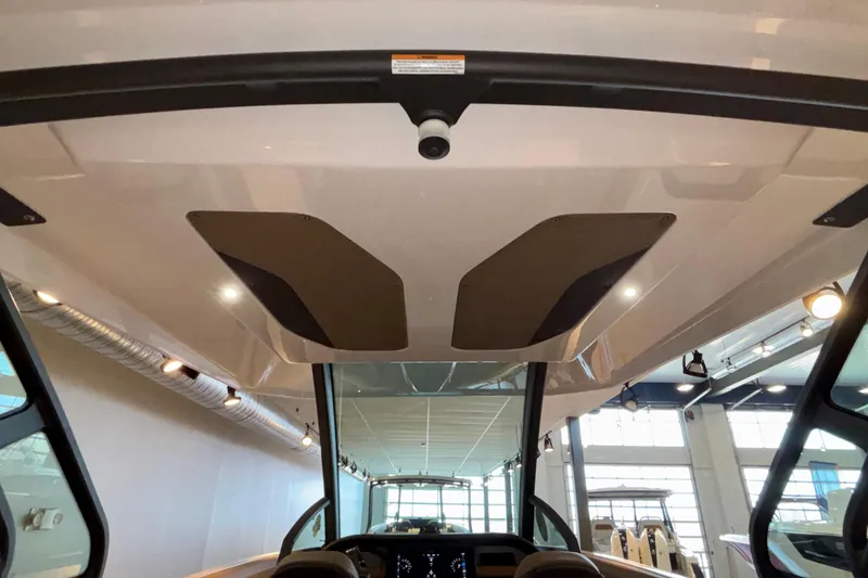 Slide: The Image of 2026 Monterey Elite 30 OB boat interior with modern design and lighting. - 69