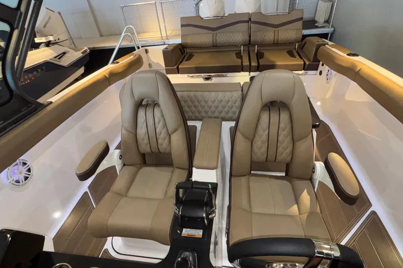 Slide: The Image of Luxurious interior of 2026 Monterey Elite 30 OB boat with plush seating. - 73