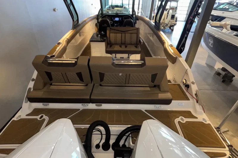 Slide: The Image of 2026 Monterey Elite 30 OB boat interior with luxurious seating and modern design. - 75