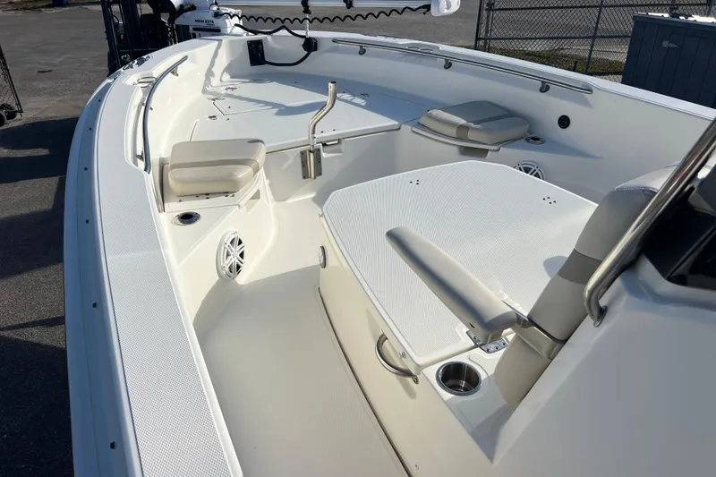 Slide: The Image of 2021 Boston Whaler 250 Dauntless boat interior with seating and storage compartments. - 12