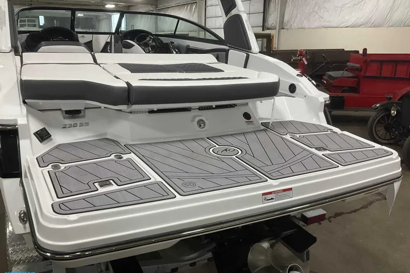 Slide: The Image of 2023 Monterey 238SS Super Sport boat interior with sleek seating and modern design. - 3