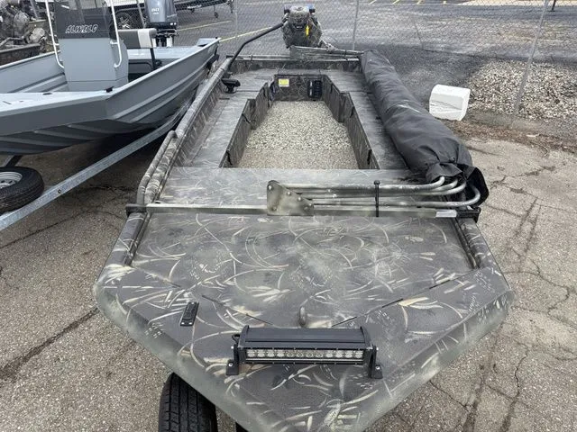 Slide: The Image of Camouflage boat Excel 1954 DGB, year 2020, parked outdoors. - 4