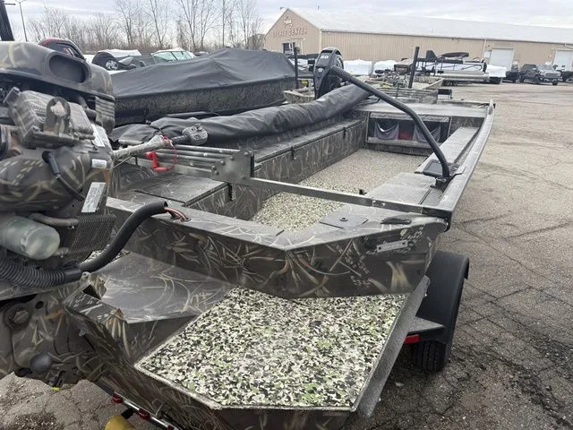 Slide: The Image of Camouflage boat Excel 1954 DGB, year 2020, parked outdoors. - 7