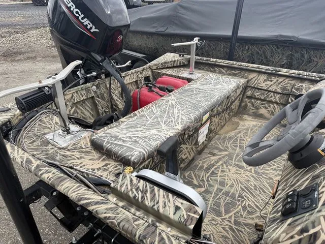 Slide: The Image of 2022 Lowe 1860 ROUGHNECK SC boat with camouflage design and Mercury engine. - 6