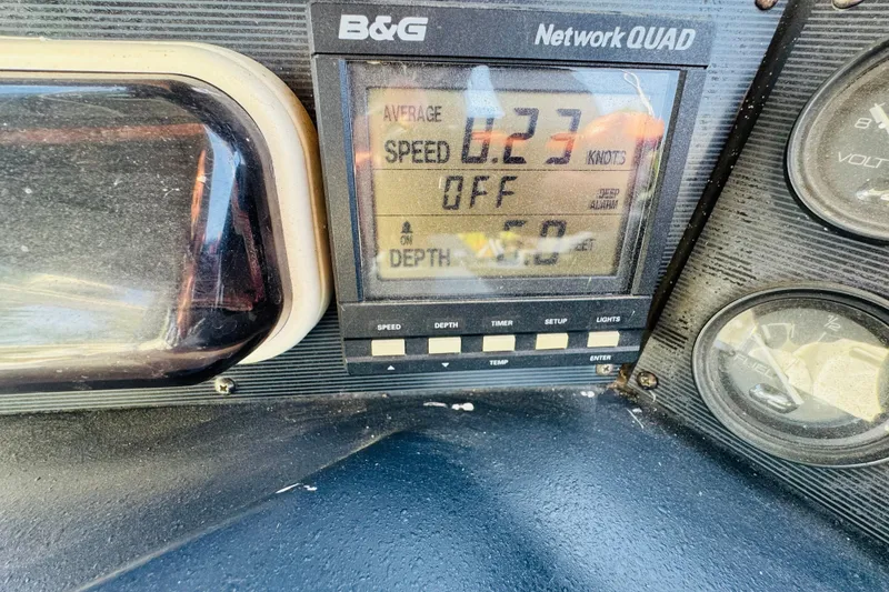 Slide: The Image of B&G Network QUAD display on 1991 Sea Ray 380 Aft Cabin showing speed and depth. - 15