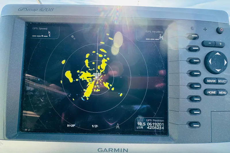 Slide: The Image of Garmin GPSmap 4208 displaying radar on a 1991 Sea Ray 380 Aft Cabin boat. - 17
