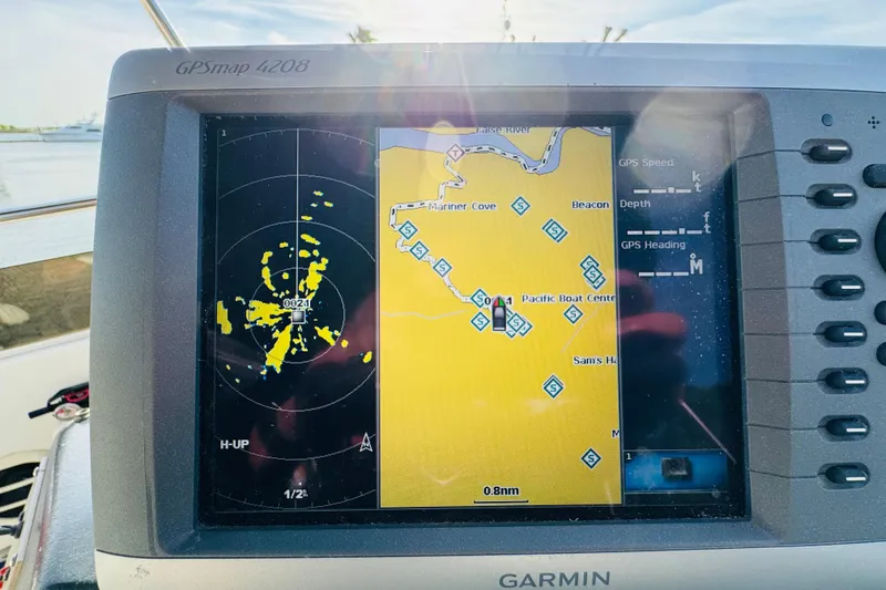 Slide: The Image of Garmin GPSmap 4208 displaying nautical chart on Sea Ray 380 Aft Cabin, 1991 model. - 18