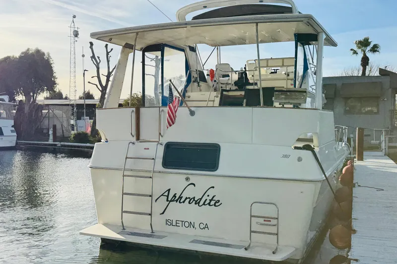 Slide: The Image of 1991 Sea Ray 380 Aft Cabin yacht docked, named "Aphrodite," Isleton, CA. - 5