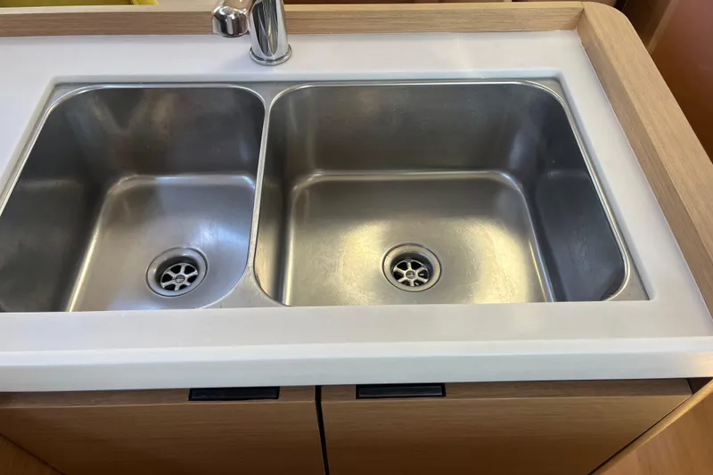Slide: The Image of Stainless steel double sink in 2023 Jeanneau Sun Odyssey 380 yacht kitchen. - 23