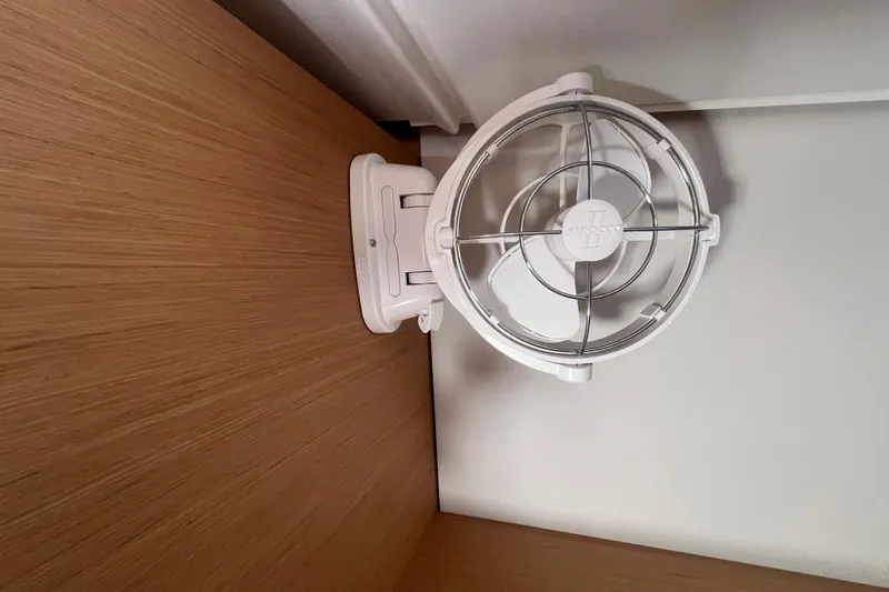 Slide: The Image of Wall-mounted fan inside 2023 Jeanneau Sun Odyssey 380 yacht cabin. - 29