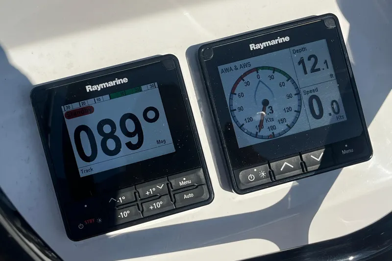 Slide: The Image of Raymarine navigation displays on 2023 Jeanneau Sun Odyssey 380 yacht, showing heading and depth. - 40