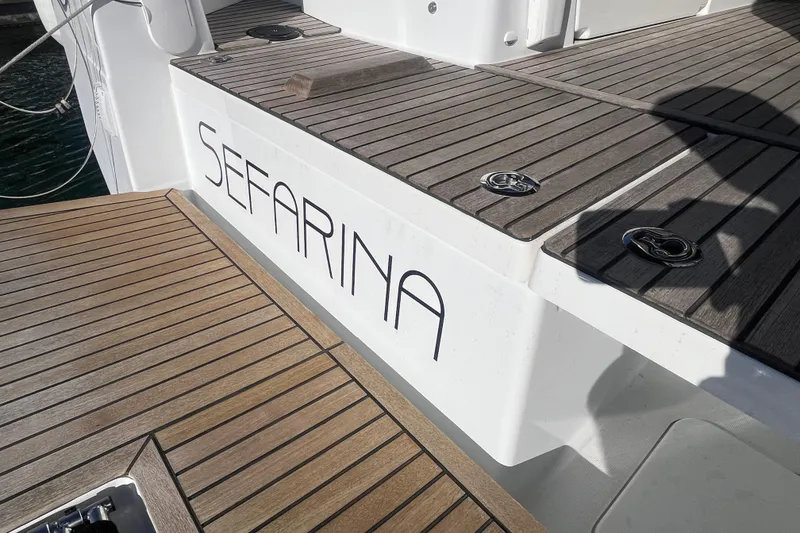 Slide: The Image of 2023 Jeanneau Sun Odyssey 380 yacht deck with "Sefarina" nameplate. - 50