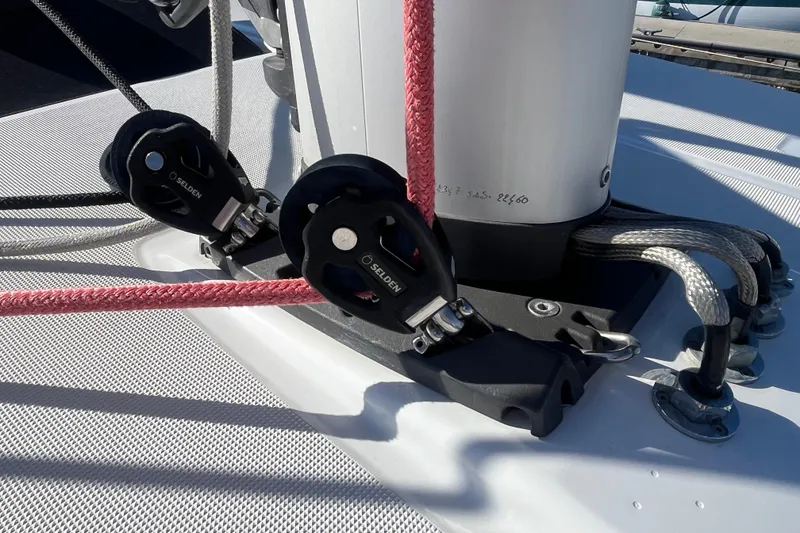 Slide: The Image of Close-up of rigging on a 2023 Jeanneau Sun Odyssey 380 sailboat. - 53
