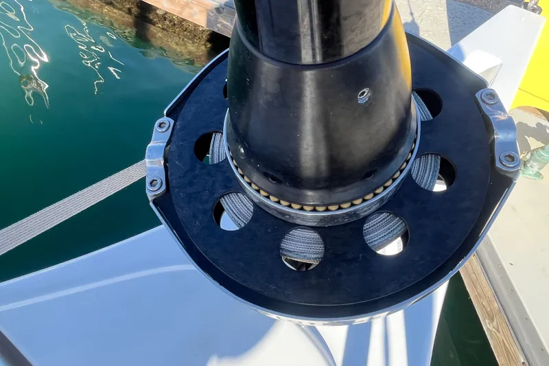 Slide: The Image of Close-up of Jeanneau Sun Odyssey 380 sailboat rigging, 2023 model, docked by the water. - 58