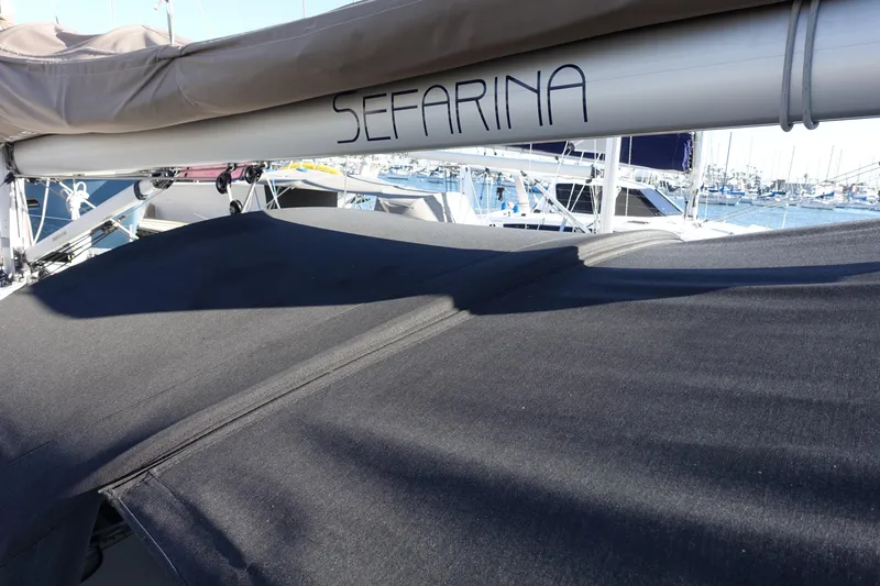 Slide: The Image of Jeanneau Sun Odyssey 380 sailboat, 2023 model, docked with covered deck. - 62