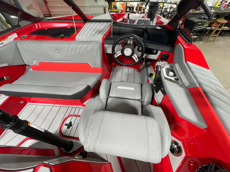 Slide: The Image of Interior of 2026 Nautique Ski Nautique boat, red and gray. - 10