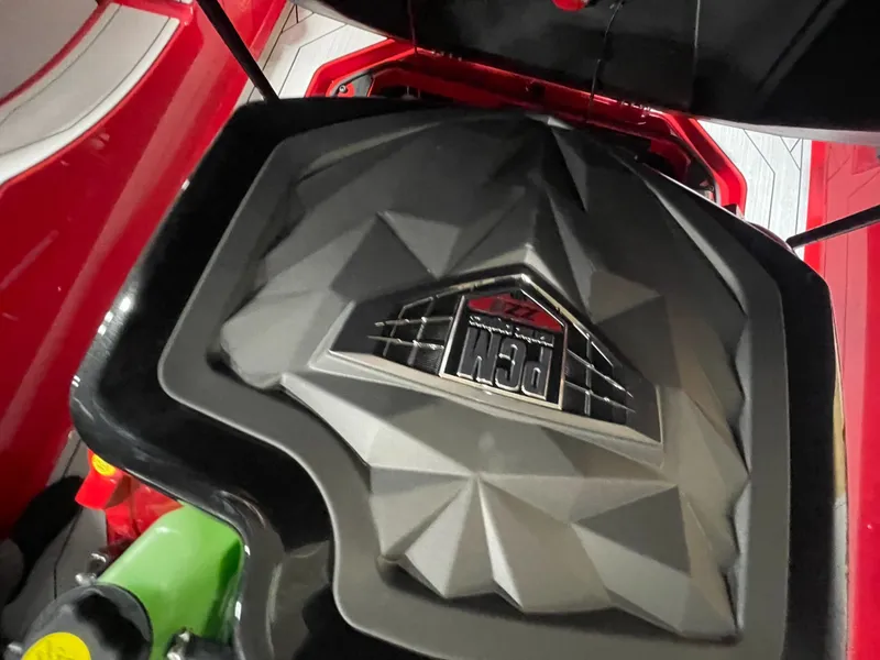 Slide: The Image of Engine cover of the 2026 Nautique Ski Nautique boat. - 15