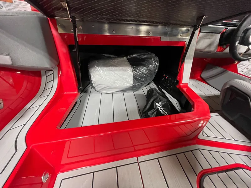 Slide: The Image of Interior of 2026 Nautique Ski Nautique with storage compartment. - 17