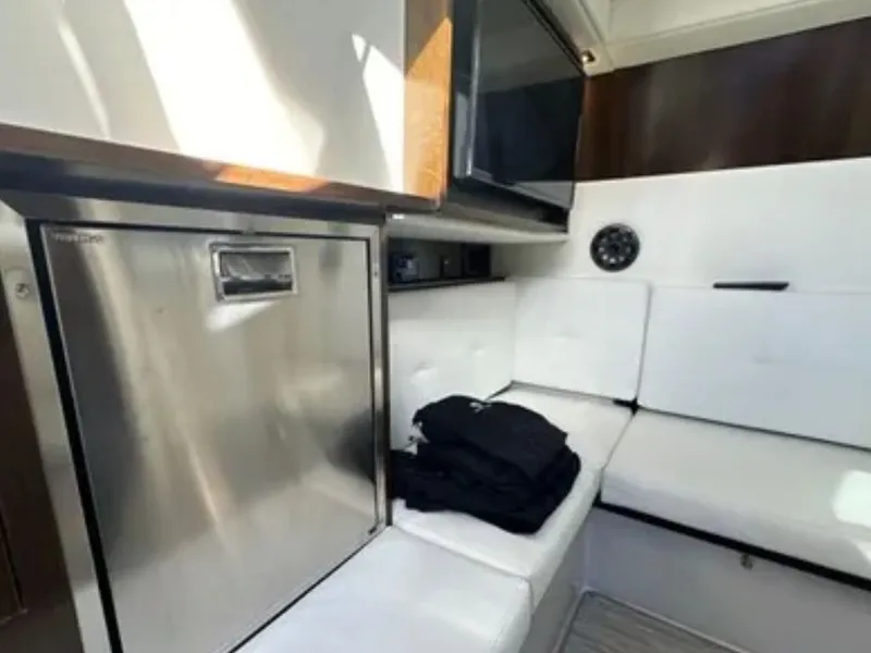 Slide: The Image of Interior of 2021 Cruisers Yachts 338 SS Outboard South Beach. - 19
