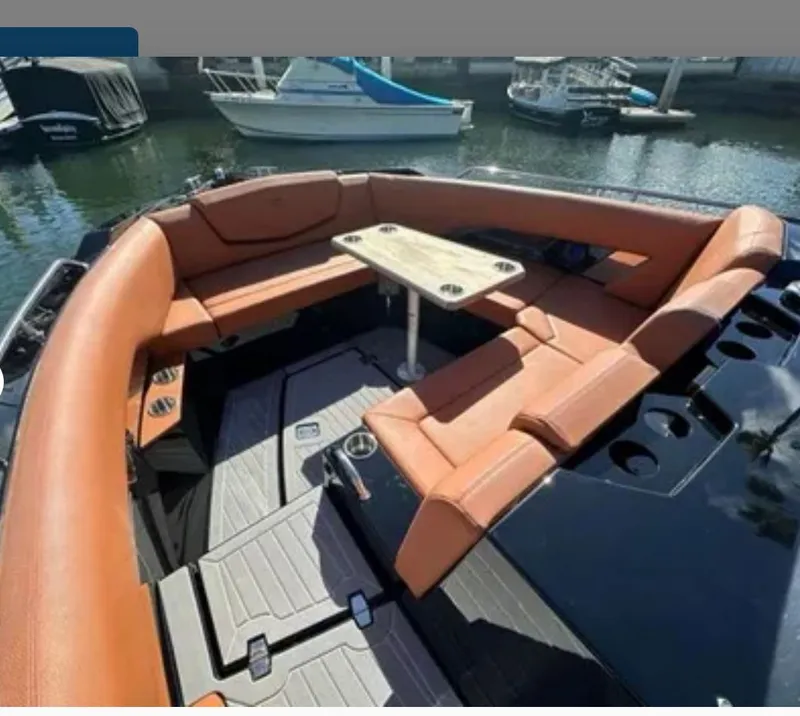 Slide: The Image of Luxurious seating area on 2021 Cruisers Yachts 338 SS Outboard. - 6