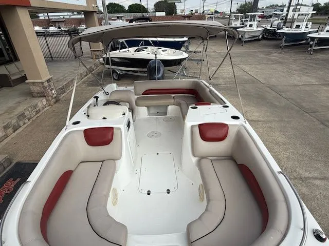 Slide: The Image of 2014 Hurricane SSR188 boat with red and beige interior. - 10