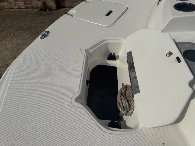 Slide: The Image of Open storage compartment on a 2014 Hurricane SSR188 boat. - 18