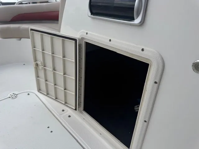 Slide: The Image of Open storage compartment on a 2014 Hurricane SSR188 boat. - 21