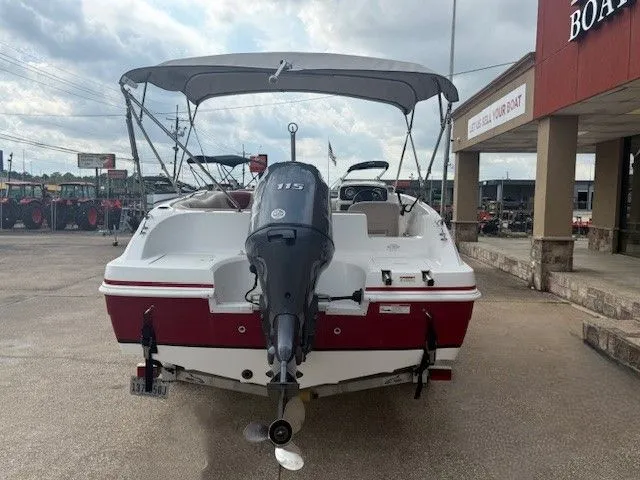 Slide: The Image of 2014 Hurricane SSR188 boat with outboard motor on parking lot. - 8