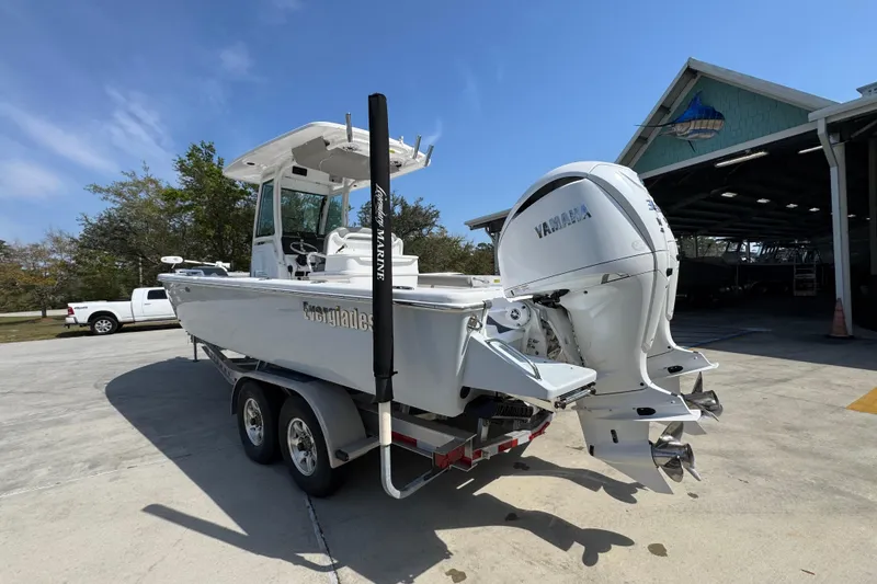 Slide: The Image of 2023 Everglades 273 Center Console boat with Yamaha engine on trailer. - 17