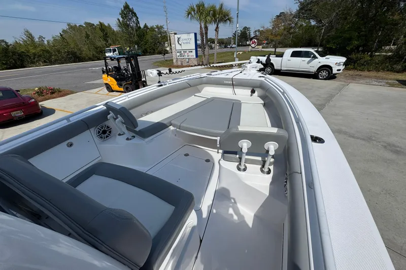 Slide: The Image of 2023 Everglades 273 Center Console boat with sleek seating and modern design. - 19