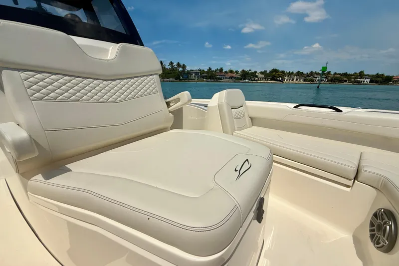 Slide: The Image of Luxurious seating on 2026 Scout 281 XSS boat, featuring elegant design and waterfront view. - 20