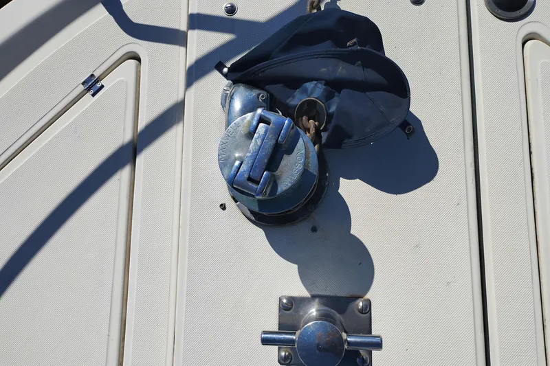 Slide: The Image of Anchor winch on 1988 PT 52 AFT Cabin Motor Yacht deck. - 100