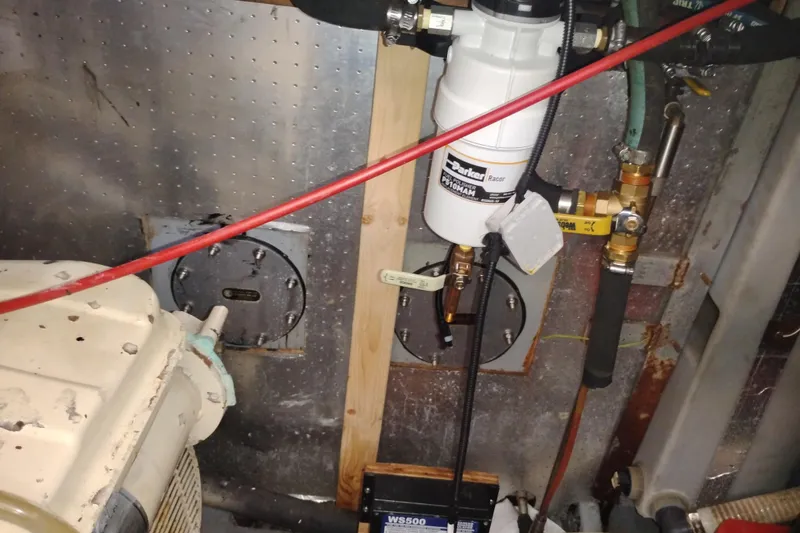 Slide: The Image of Engine room of 1988 PT 52 AFT Cabin Motor Yacht with fuel filter system. - 108