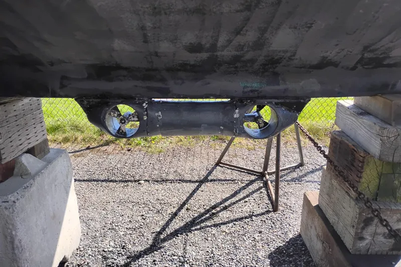 Slide: The Image of 1988 PT 52 AFT Cabin Motor Yacht propeller and hull on dry dock. - 111